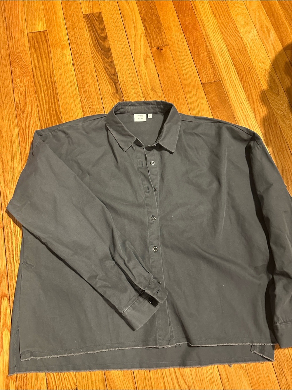 Grey button down shirt